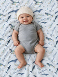 Personalized ocean whale baby blanket on white with script name
