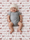 Personalized pink bow baby blanket with custom name